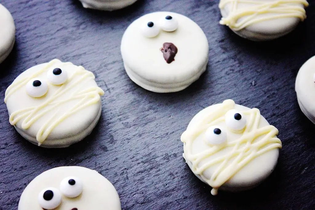 close side view of halloween decorated oreo cookies