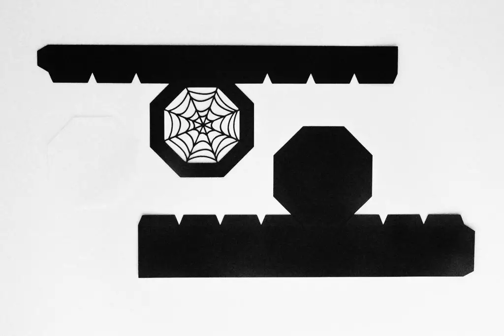 the three individual pieces of the treat box after they've cut with the Cricut machine